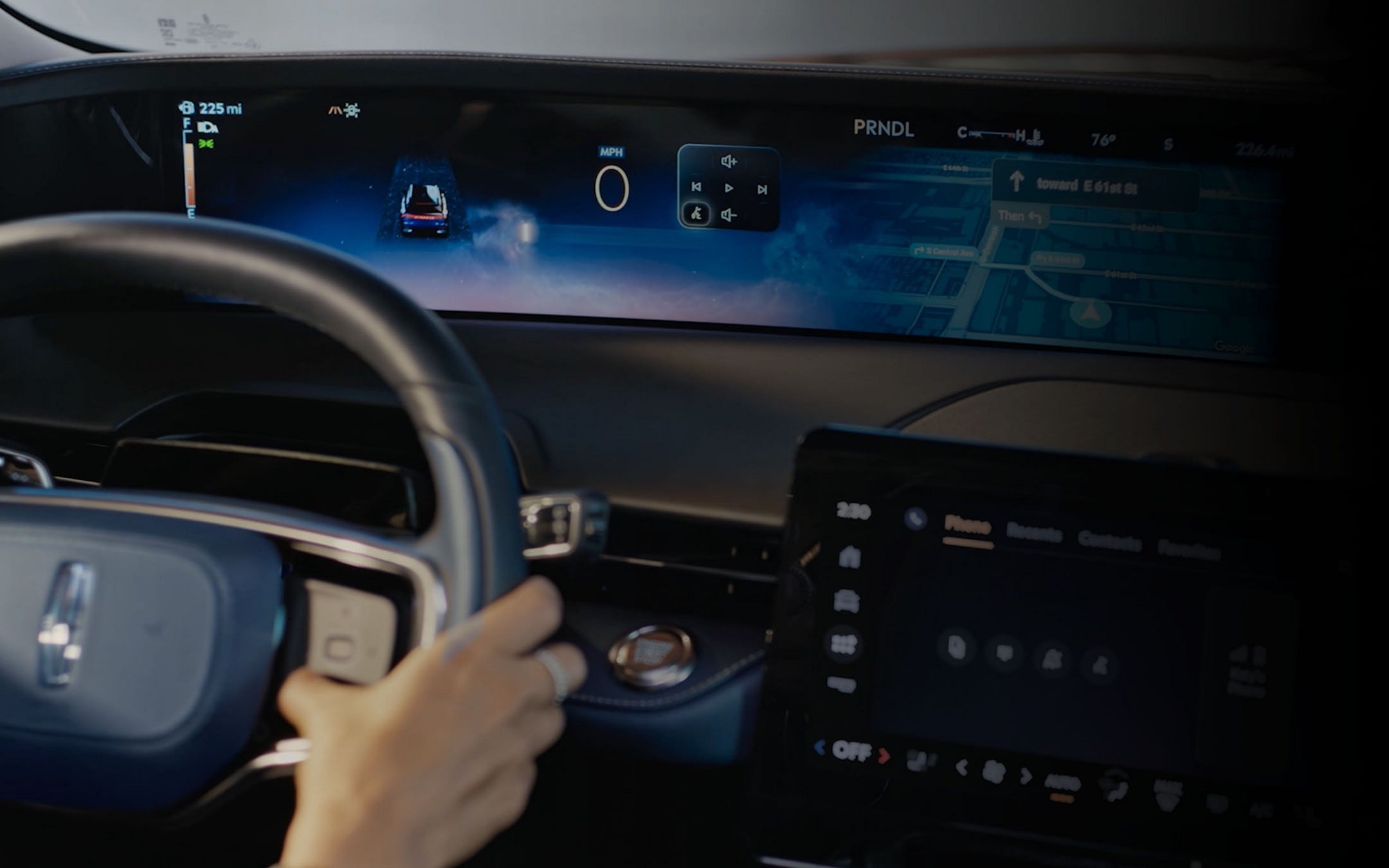 The driver of a 2025 Lincoln Nautilus® SUV interacts with capacitive touch steering wheel controls