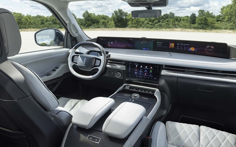 The front cabin of a 2025 Lincoln Black Label Navigator® SUV in the Atmospheric theme