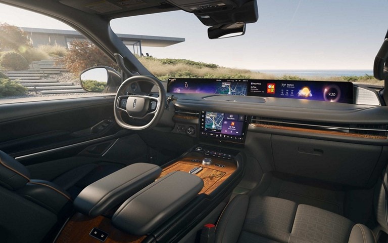 The dashboard of a 2025 Lincoln Black Label Navigator® SUV highlights the panoramic display with the Invitation theme