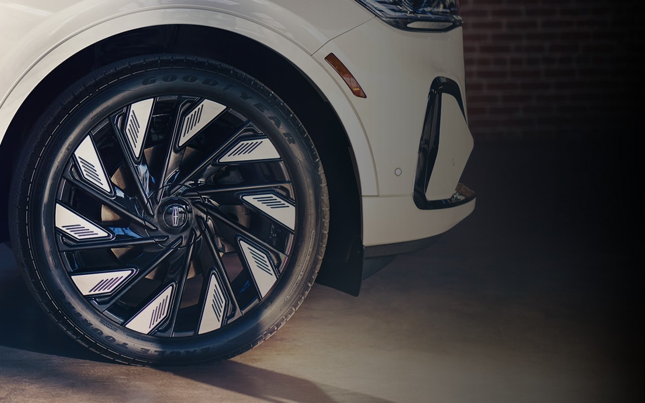 Stylish 10-spoke wheels are shown on a 2024 Lincoln Black Label Nautilus® SUV.