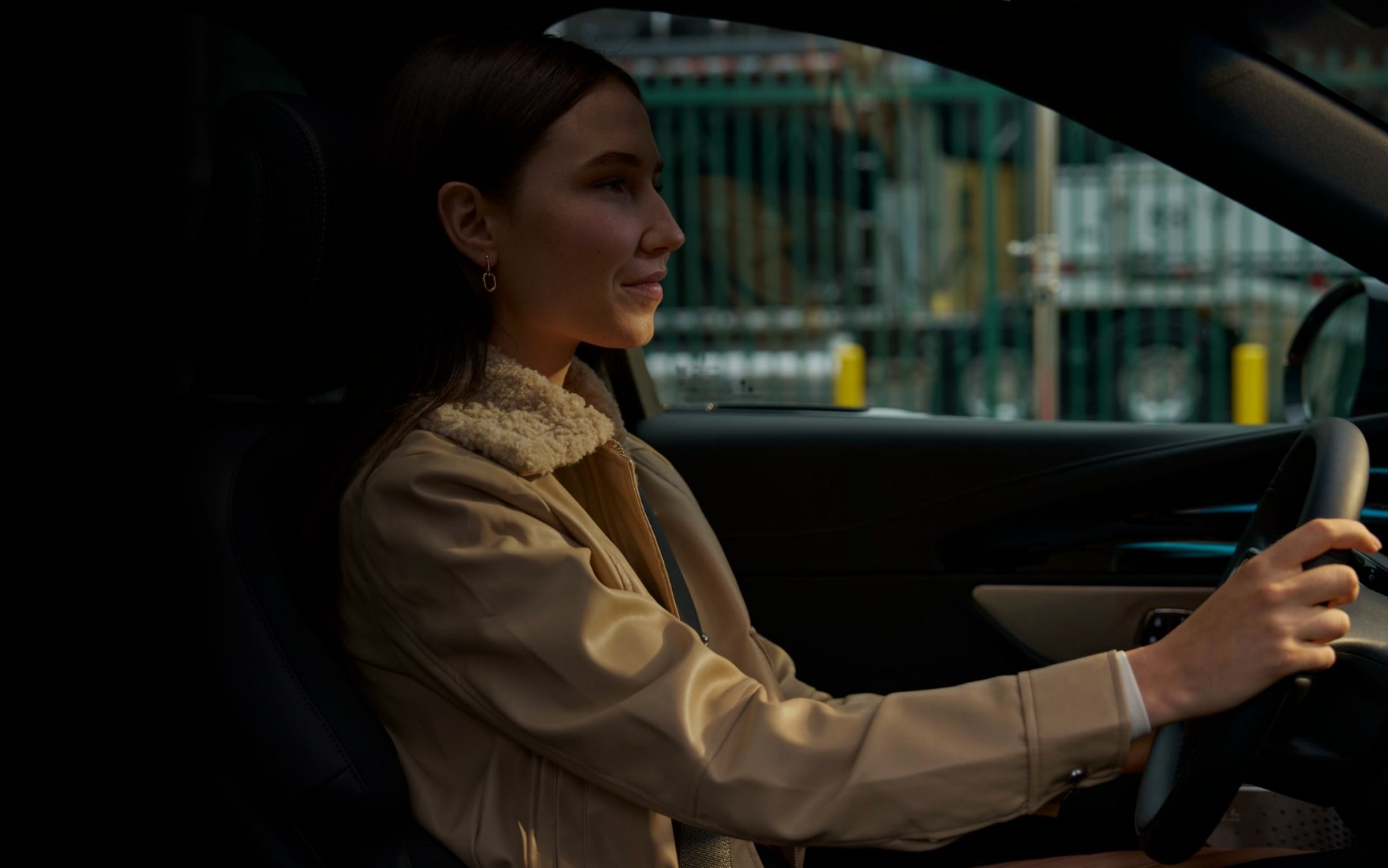 A woman is shown driving the 2025 Lincoln Nautilus